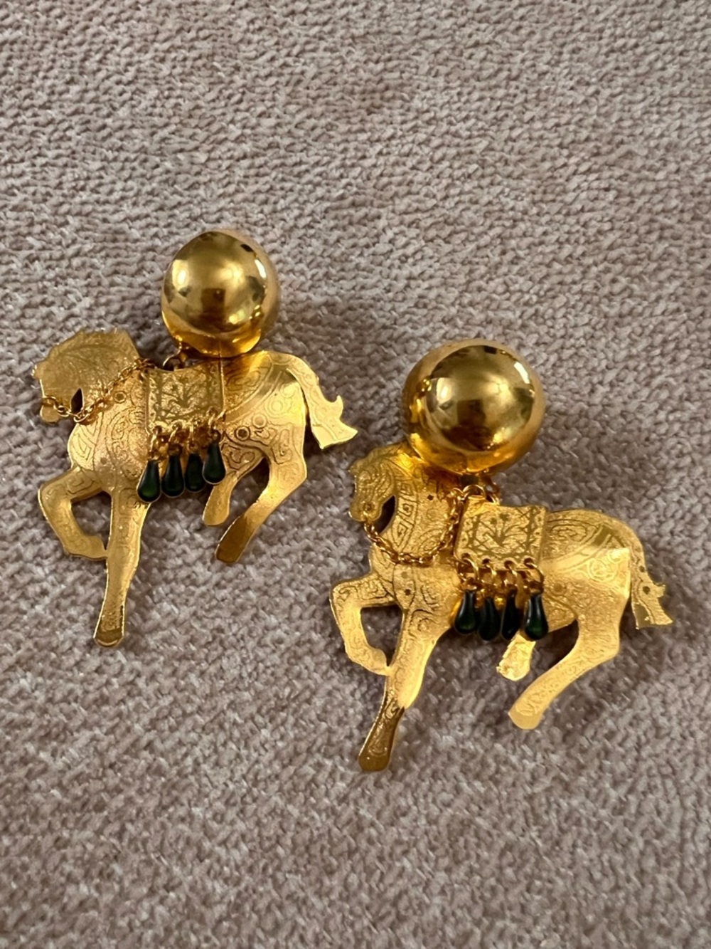 Gold-tone Horse Dangle Clip Earrings with Green Teardrops